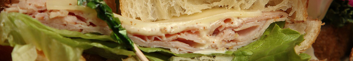 Eating Sandwich Cafe at Caffe Adagio restaurant in Bellingham, WA.